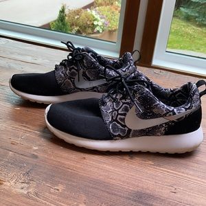 Snakeskin patterned Nike runners
